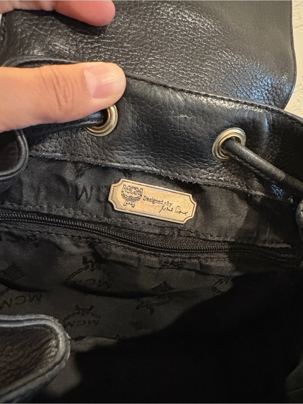 MCM Black Leather Drawstring Backpack with Gold Hardware